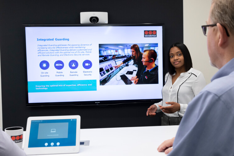 Sales meeting to discuss Integrated Guarding solutions.