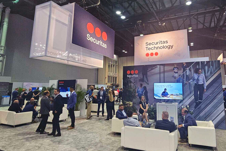 Picture of Securitas’s booth at the GSX 2024 Conference, with a lot of traffic in the booth, Securitas banners being displayed.