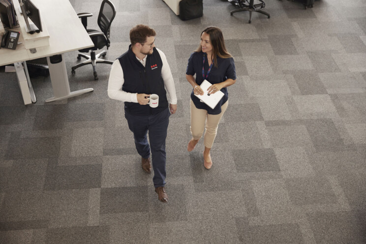 Securitas employees talking in the office