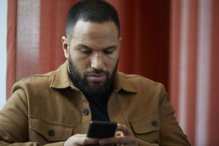 Man looking at his phone